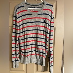 American Eagle size L V-neck. Gray red and blue.